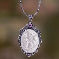 Bone and amethyst pendant necklace, 'Seven Fish' - Amethyst Necklace with Carved Bone Medallion