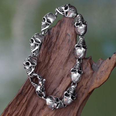 Men's sterling silver link bracelet, 'Trunyan' - Men's Sterling Silver Skull Bracelet from Bali