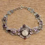 Amethyst and garnet link bracelet, 'Sleeping Princess' - Amethyst and Garnet Sterling Silver Link Bracelet from Bali