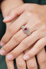 Garnet and gold accent cocktail ring, 'Crimson Treasure' - Garnet and Gold Accented Silver Cocktail Ring