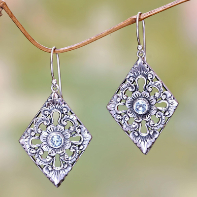 Blue topaz dangle earrings, 'Blue Padma' - Sterling Silver and Blue Topaz Earrings with Floral Motif