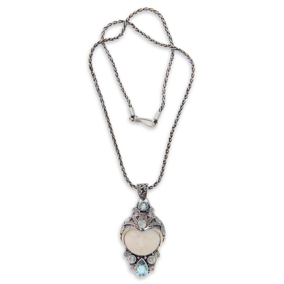 Blue topaz and bone pendant necklace, 'Dayang Sumbi' - Carved Bone and Blue Topaz Silver Pendant Necklace