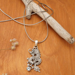 Men's blue topaz necklace, 'Dragon's Ball' - Men's Jewelry Sterling Silver and Blue Topaz Necklace