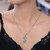 Men's blue topaz necklace, 'Dragon's Ball' - Men's jewellery Sterling Silver and Blue Topaz Necklace