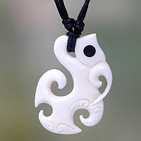 Bone pendant necklace, 'Ancient Fish' - Fair Trade Carved Cow Bone Pendant Necklace