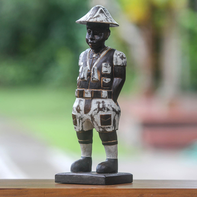 Wood sculpture, 'Sinyo' - Distressed Hand Carved Wood Statuette of Dutch Boy