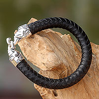 Men's leather and sterling silver bracelet, 'Mammoth' - Men's Braided Black Leather and Silver Mammoth Bracelet
