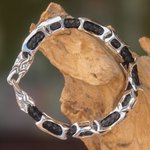 Men's leather and sterling silver bracelet, 'Bone Dragon' - Sterling Silver and Braided Black Leather Men's Bracelet