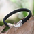 Leather and sterling silver bracelet, 'Undercurrents' - Fair Trade Women's Black Leather and Silver Bracelet (image p231617) thumbail