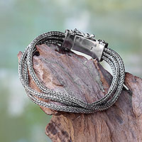 Sterling silver chain bracelet, 'Dragon Tails' - Triple Strand Sterling Silver Naga Chain Bracelet from Bali