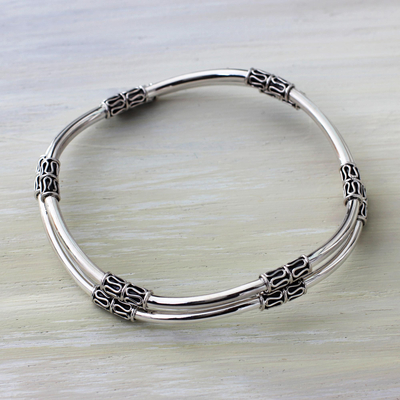 Sterling silver bangle bracelets, 'Elements of Life' (pair) - Balinese Handcrafted Sterling Silver Bangle Bracelets (Pair)