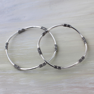 Sterling silver bangle bracelets, 'Elements of Life' (pair) - Balinese Handcrafted Sterling Silver Bangle Bracelets (Pair)
