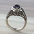 Amethyst solitaire ring, 'Magic Garden' - Ornate Amethyst Solitaire Ring with Silver Floral Cutouts (image 2) thumbail
