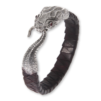 Sterling silver and leather braided bracelet, 'Baru Klinting' - Brown Leather Garnet Eyes Sterling Silver Snake Bracelet