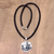 Leather and bone pendant necklace, 'Virgo' - Artisan Crafted Virgo Zodiac Leather Cord Pendant Necklace thumbail