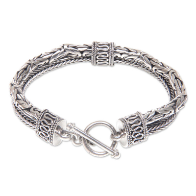 Sterling silver braided bracelet, 'Dragon Lore' - Sterling Silver Naga and Borobudur Braided Bracelet
