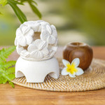 Limestone tealight candleholder, 'Hibiscus' - Carved Floral Limestone Tealight Candleholder from Bali
