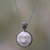 Sterling silver pendant necklace, 'Moon Romancing' - Balinese Handcrafted Silver Necklace with Bone Inlay thumbail