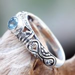 Blue topaz solitaire ring, 'Hearts Connected' - Blue Topaz Artisan Crafted Bali Silver Solitaire Ring