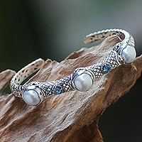 Cultured pearl and blue topaz cuff bracelet, 'Three Moons' - Pearl Sterling Silver Hinged Cuff Bracelet with Blue Topaz