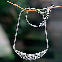 Reversible sterling silver pendant necklace, 'Lotus Hearts' - Reversible Sterling Silver Handcrafted Heart Theme Necklace