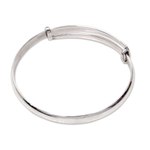 Sterling silver bangle bracelet, 'Tender Embrace' - Balinese Handcrafted Sterling Silver Bangle Bracelet