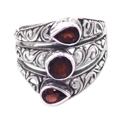 Garnet cocktail ring, 'Three Loves' - Three Stone Faceted Garnet and Silver Ring Crafted in Bali