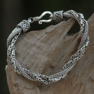 Sterling silver braided bracelet, 'Sanca Batik' - Handcrafted Triple Braid Sterling Silver Bracelet from Bali