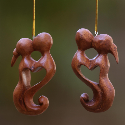 Wood ornaments, 'Kiss of Love' (pair) - Hand Carved Suar Wood Heart Ornament Paie of Kissing Couple
