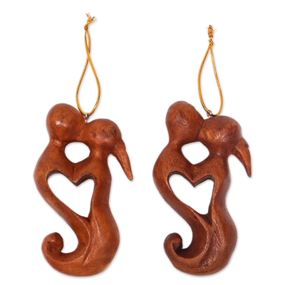 Wood ornaments, 'Kiss of Love' (pair) - Hand Carved Suar Wood Heart Ornament Paie of Kissing Couple