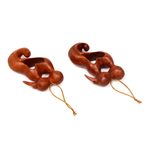 Wood ornaments, 'Kiss of Love' (pair) - Hand Carved Suar Wood Heart Ornament Paie of Kissing Couple