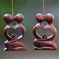 Wood ornaments, 'Forever Together' (pair) - Two Heart Ornaments of Couple Kissing Hand Carved of Wood