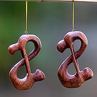 Wood ornaments, 'Yogi Lovers' (pair)