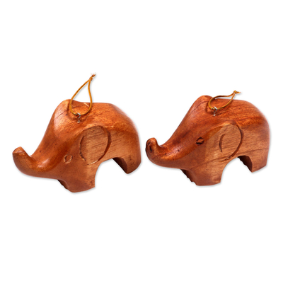 Wood ornaments, 'Little Brown Elephants' (pair) - Hand Carved Petite Brown Elephant Wood Ornament Pair