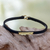 Leather wristband bracelet, 'Breathe' - Engraved Brass on Slender Leather Wristband Bracelet thumbail