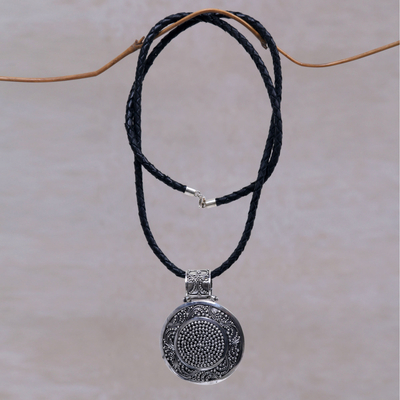Sterling silver and leather pendant necklace, 'Circular Visions' - Artisan Crafted Necklace Sterling Silver on Leather