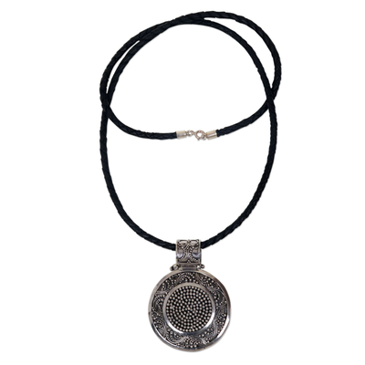 Sterling silver and leather pendant necklace, 'Circular Visions' - Artisan Crafted Necklace Sterling Silver on Leather