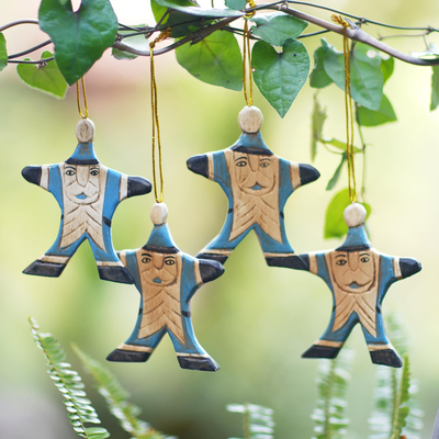 Wood ornaments, 'Happy Blue Santa' (set of 4) - Set of 4 Blue Santa Christmas Ornaments Handpainted in Bali