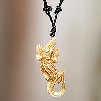 Bone pendant necklace, 'Alligator' - Carved Bone Alligator Pendant Necklace on Leather Cord