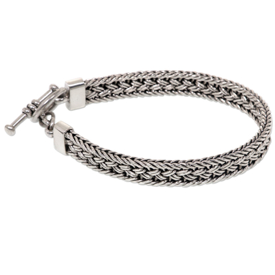 Sterling silver bracelet, 'Tukad Pakerisan' - Balinese Braided Sterling Silver Bracelet with Toggle Clasp