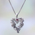 Garnet pendant necklace, 'Heart of the Vineyard' - Heart Shaped Sterling Silver Pendant Necklace with Grapes thumbail