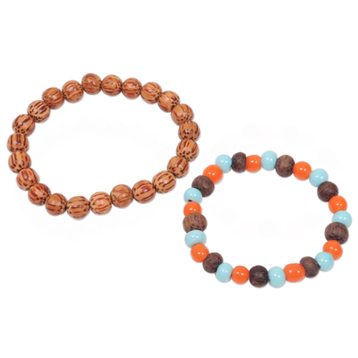 Beaded stretch bracelets, 'Bangli Dawn' (pair) - Artisan Crafted Ceramic and Wood Bead Bracelets (Pair)