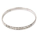 Sterling silver bangle bracelets, 'Sterling Circles' (pair) - Women's Bangle Bracelets from Bali in Sterling Silver (Pair)