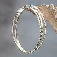 Sterling silver bangle bracelet, 'Sterling Circles' - Balinese Women's Sterling Silver Bangle Bracelet
