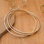 Sterling silver bangle bracelet, 'Sterling Circles' - Balinese Women's Sterling Silver Bangle Bracelet