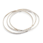 Sterling silver bangle bracelet, 'Sterling Circles' - Balinese Women's Sterling Silver Bangle Bracelet