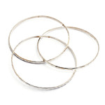 Sterling silver bangle bracelet, 'Sterling Circles' - Balinese Women's Sterling Silver Bangle Bracelet