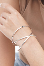 Sterling silver bangle bracelet, 'Sterling Circles' - Balinese Women's Sterling Silver Bangle Bracelet