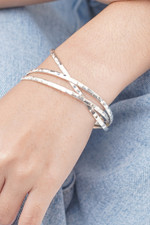 Sterling silver bangle bracelet, 'Sterling Circles' - Balinese Women's Sterling Silver Bangle Bracelet
