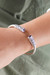 Amethyst cuff bracelet, 'Totem Hearts' - Sterling Silver Cuff Bracelet with Hearts and Amethysts